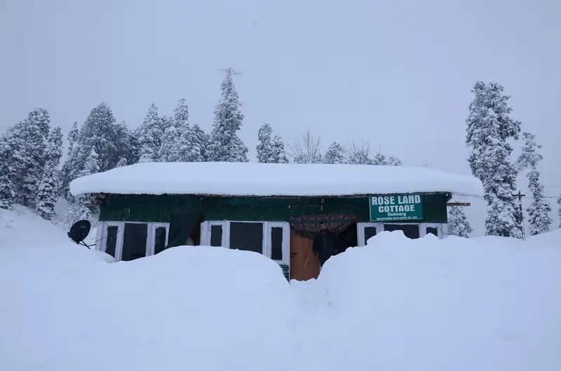 A snow-covered cottage in Gulmarg in December